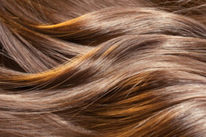 Beautiful healthy shiny hair texture with highlighted
